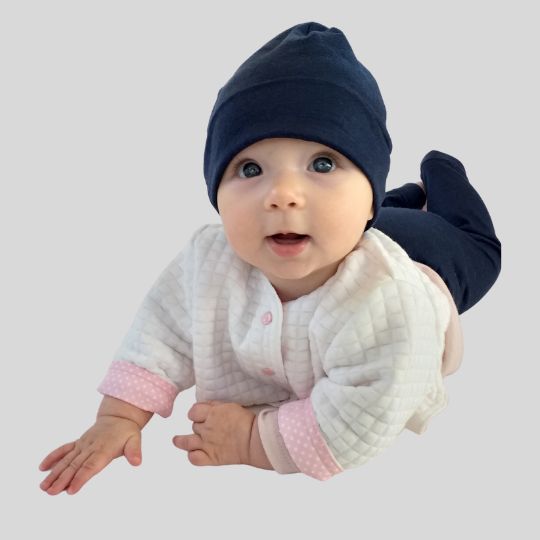 Baby Wearing White with Pink Lining Clipper Jacket