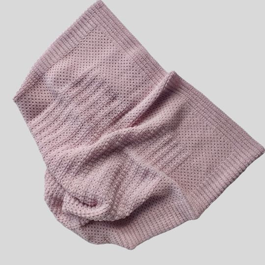 Flat thrown view of a Pink Merino Stroller Blanket