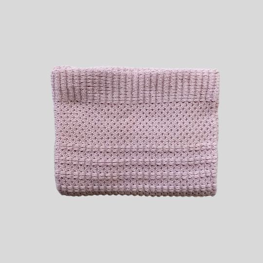 Folded view of a Pink Merino Stroller Blanket
