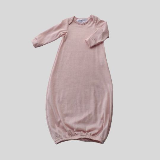 Front view of a Merino Baby Gown coloured Pink